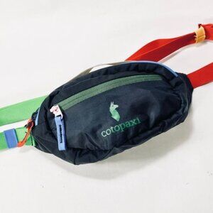 cotopaxi navy blue waist pack with green logo and red strap